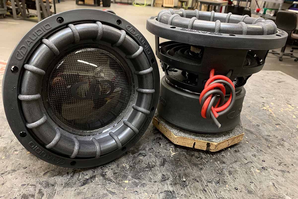 Two USA Made Subwoofers with high gloss carbon fiber dust cap and black DDA logo