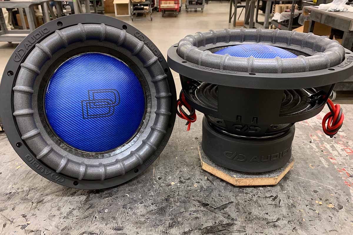 Two USA Made Subwoofers with electric blue dust caps and black DD Classic logos