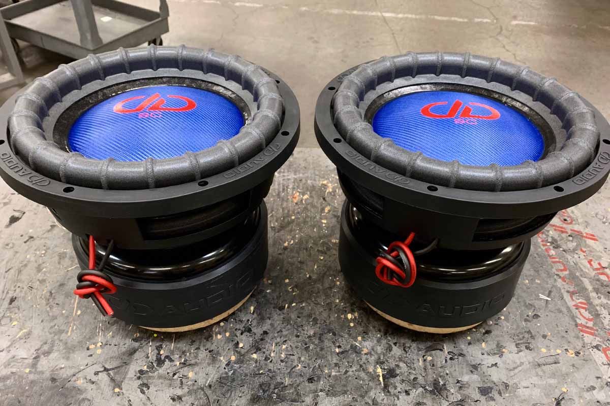 USA Made subwoofers with electric blue dust caps and red DDA logos with super charged decals