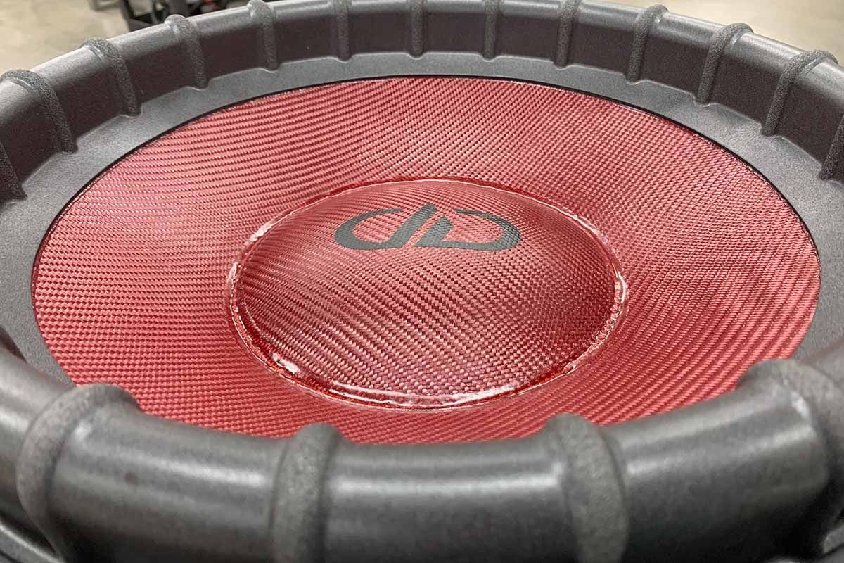 USA Made subwoofer with red carbon fiber cone and dust cap with black DDA Logo