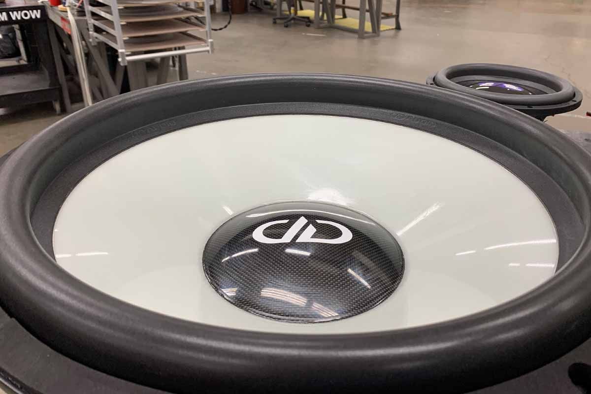USA Made Subwoofer with ghost cone and white DDA logo on high gloss carbon fiber dustcap