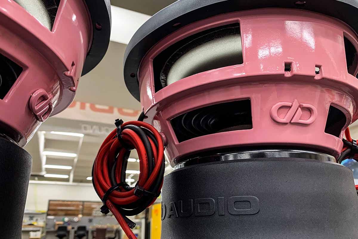 Two USA Made Subwoofers with strawberry pink power coat