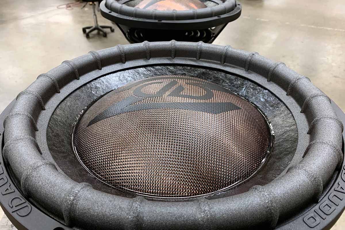 Two USA Made Subwoofers with black cones, polychromatic copper dust caps and black DD Z logos