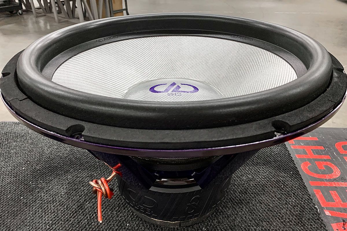made in usa 21 inch 9900 subwoofer with purple frame and platinum silver composite cone and dust cap with purple DD logo and purple supercharged logo