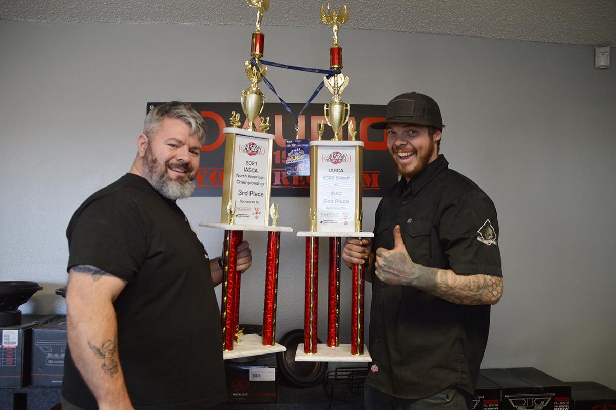 Photo of RAAM Staff with trophies