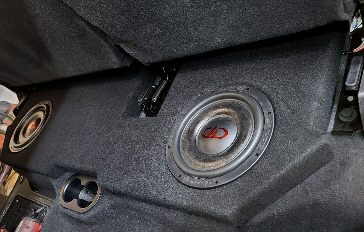 Photo of two SL610 installed under a truck seat
