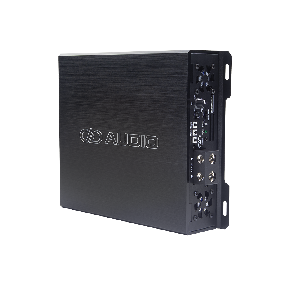 Photo of SPS on its side angled to show top plate with logo and model, and side panel with connection points and settings.