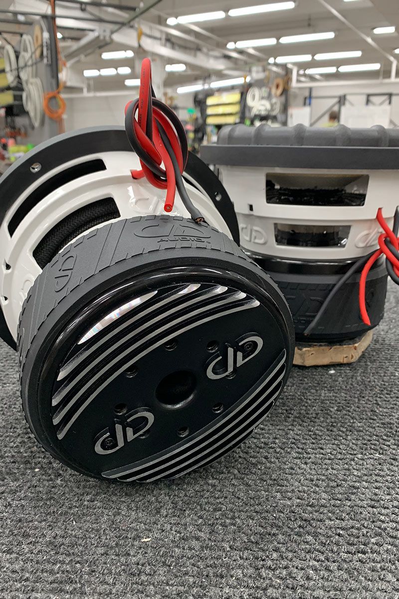 two 8 inch made in usa subwoofers with white powder coated frames
