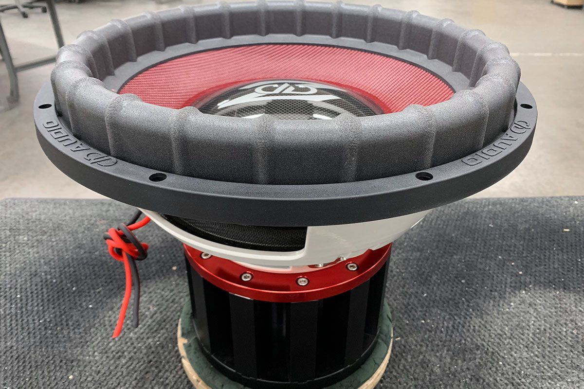 made in usa ddz3 subwoofer with white powder coated frame silver frame logos red composite cone and gloss black carbon fiber dust cap with silver ddz logo