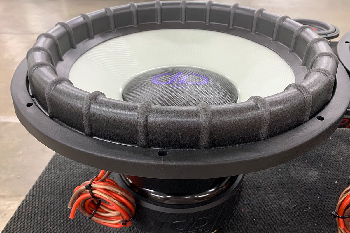 18 inch made in usa subwoofer with white composite ghost cone and black carbon fiber cone with purple DD logo