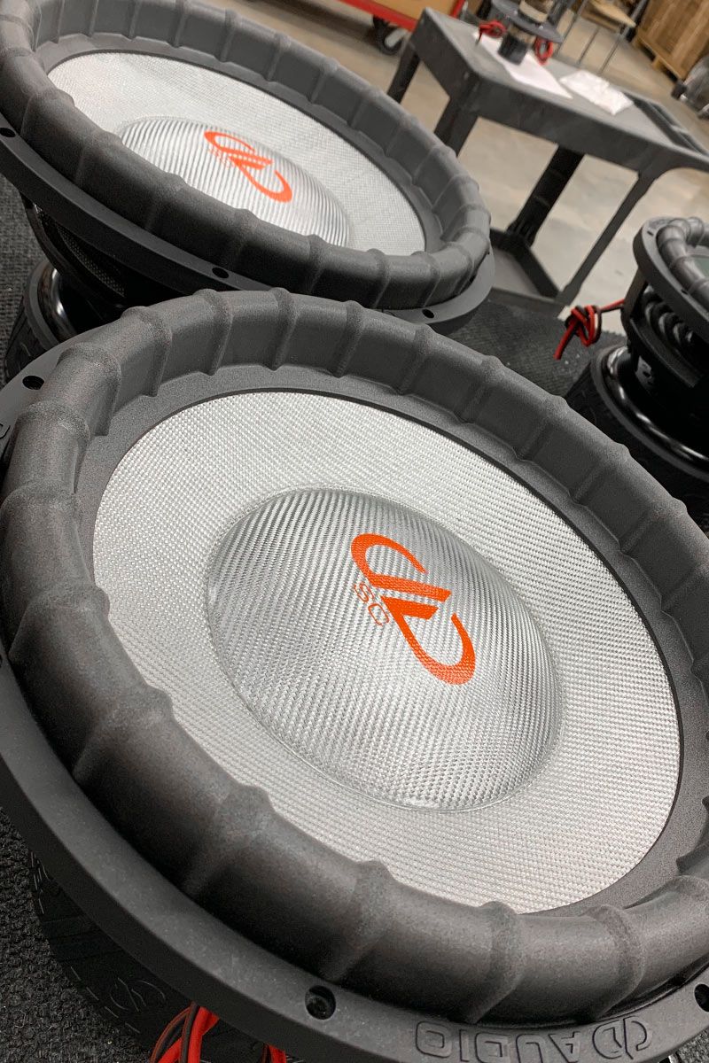 made in usa subwoofer with platinum silver composite cone and dust cap with orange DD and supercharged logos