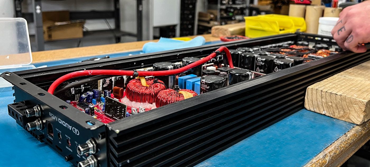 DD AUDIO amplifier and subwoofer service and repair department. Amp tech repairing amplifier.