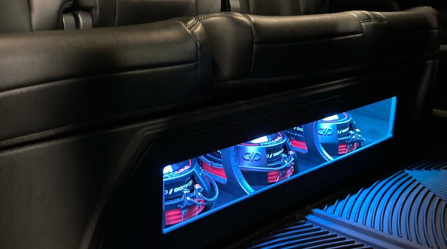 Photo of custom under seat enclosure with LED lighting, and SL612 subwoofers