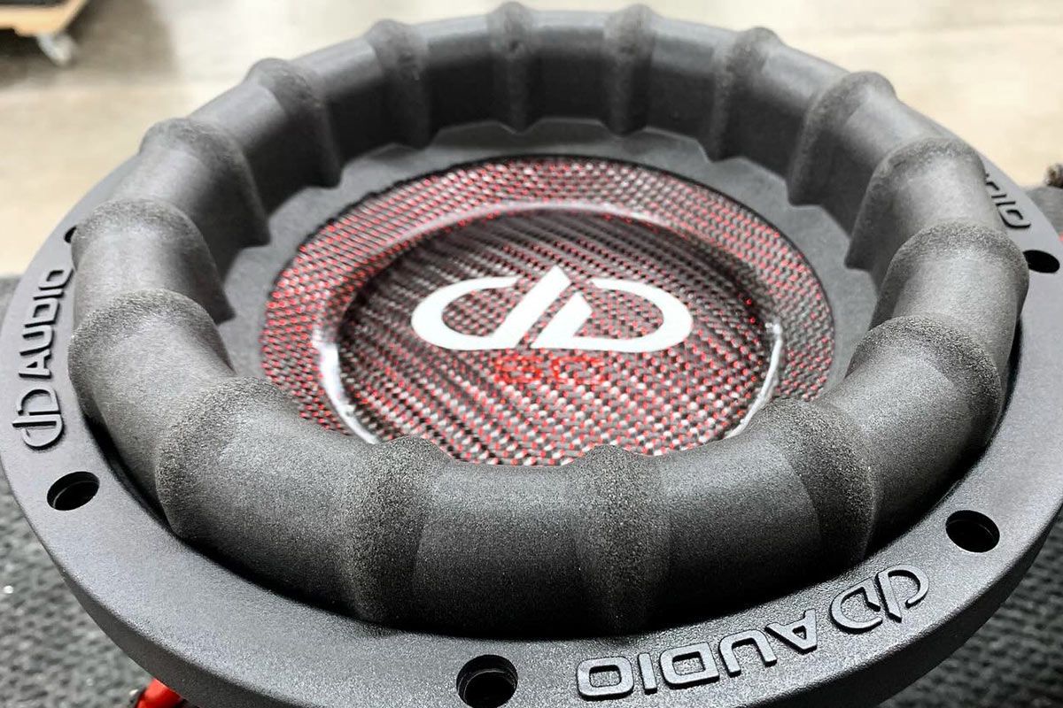 made in usa 8 inch subwoofer with ruby red composite cone and dust cap with white DD logo and white supercharged logo