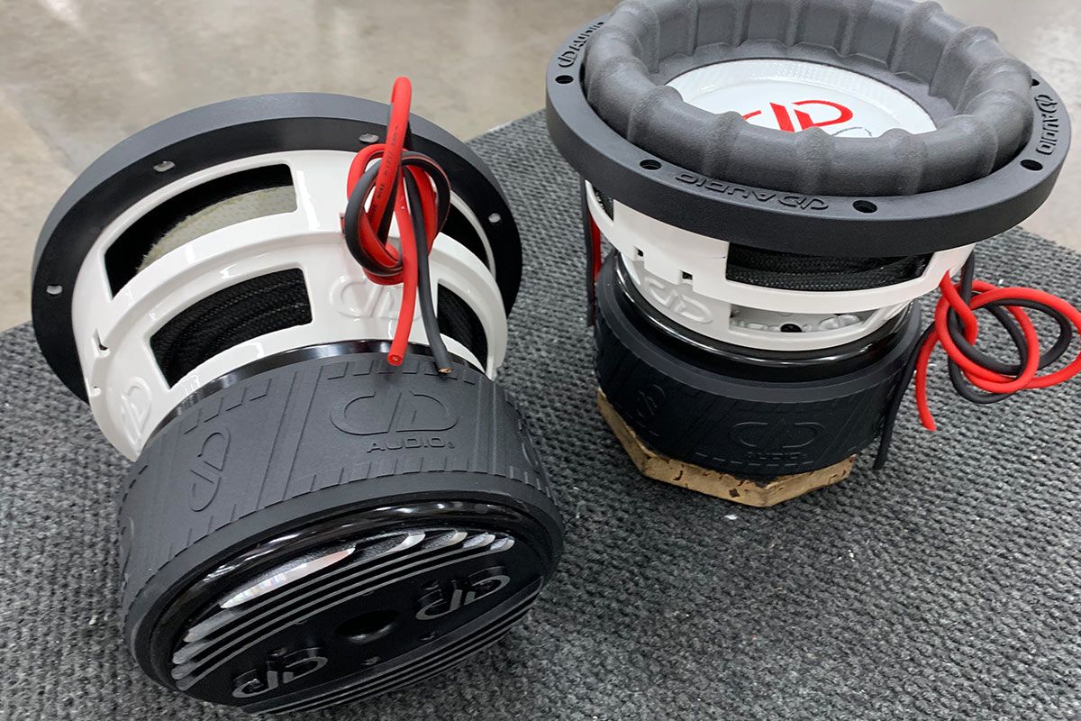 8 inch made in usa subwoofers with white powder coated frames and white composite cone and dust caps with red DD logo