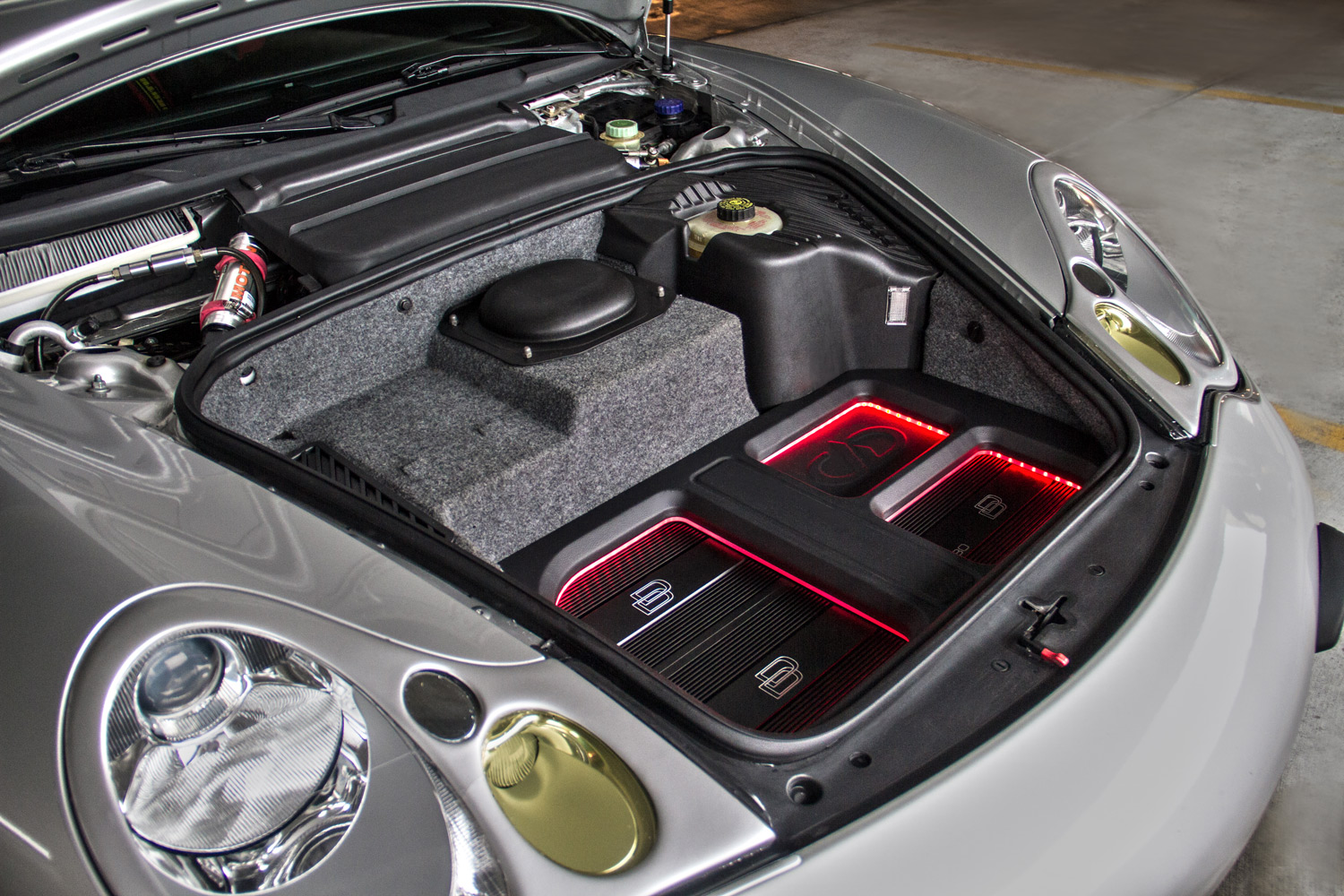 Custom Build - Trunk of Porsche with Amplifiers Bathed in Red LED