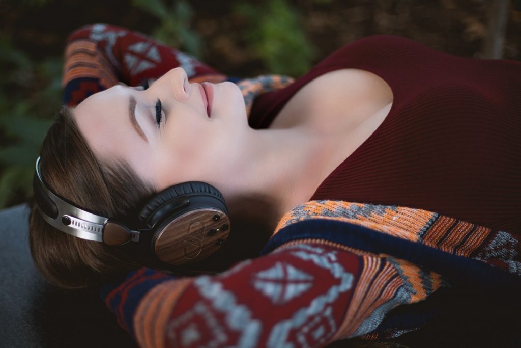 Photo of young woman relaxing with DXBT-05 headphones 