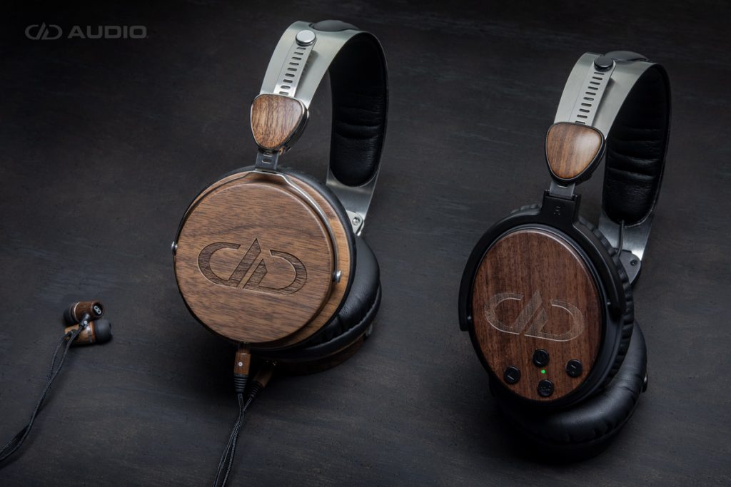 DXB-1.1 earbuds, DXB-04 and DXBT-05 headphones all in a beauty photo