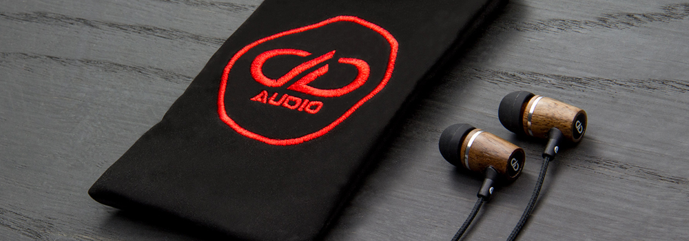 DXB-1.1 earbuds with embroidered carrying pouch