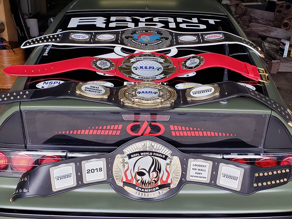 Bryant Radio championship belts