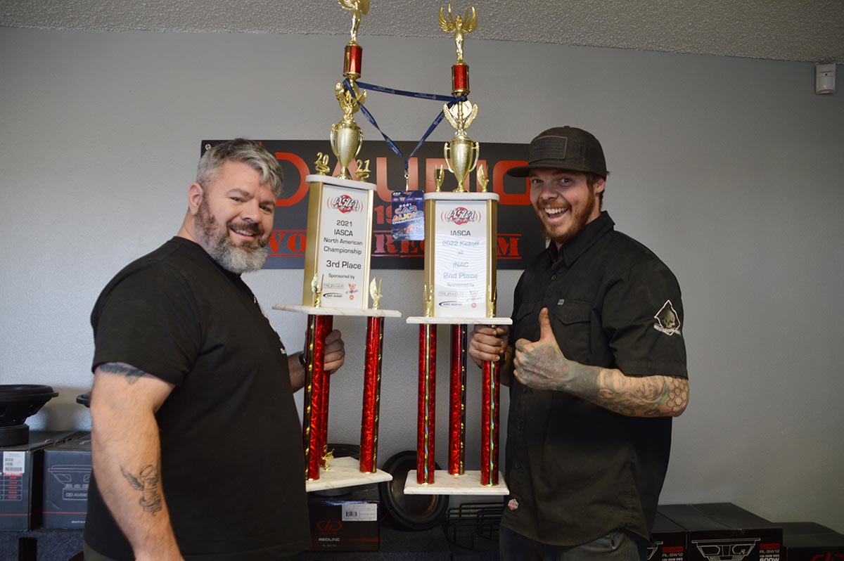 Photo of RAAM Staff with trophies