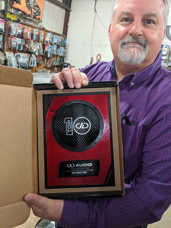 Audio Edge - Photo of Owner Tony with Top 10 Award
