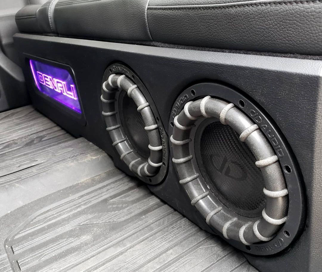 Photo of two 2508 Subwoofers installed in custom box under seat