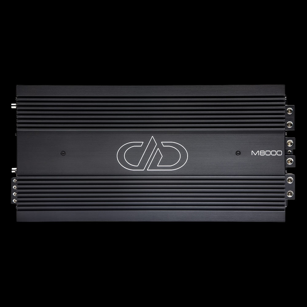 Photo of M8000 with black background, showing the full top plate with logo and model number