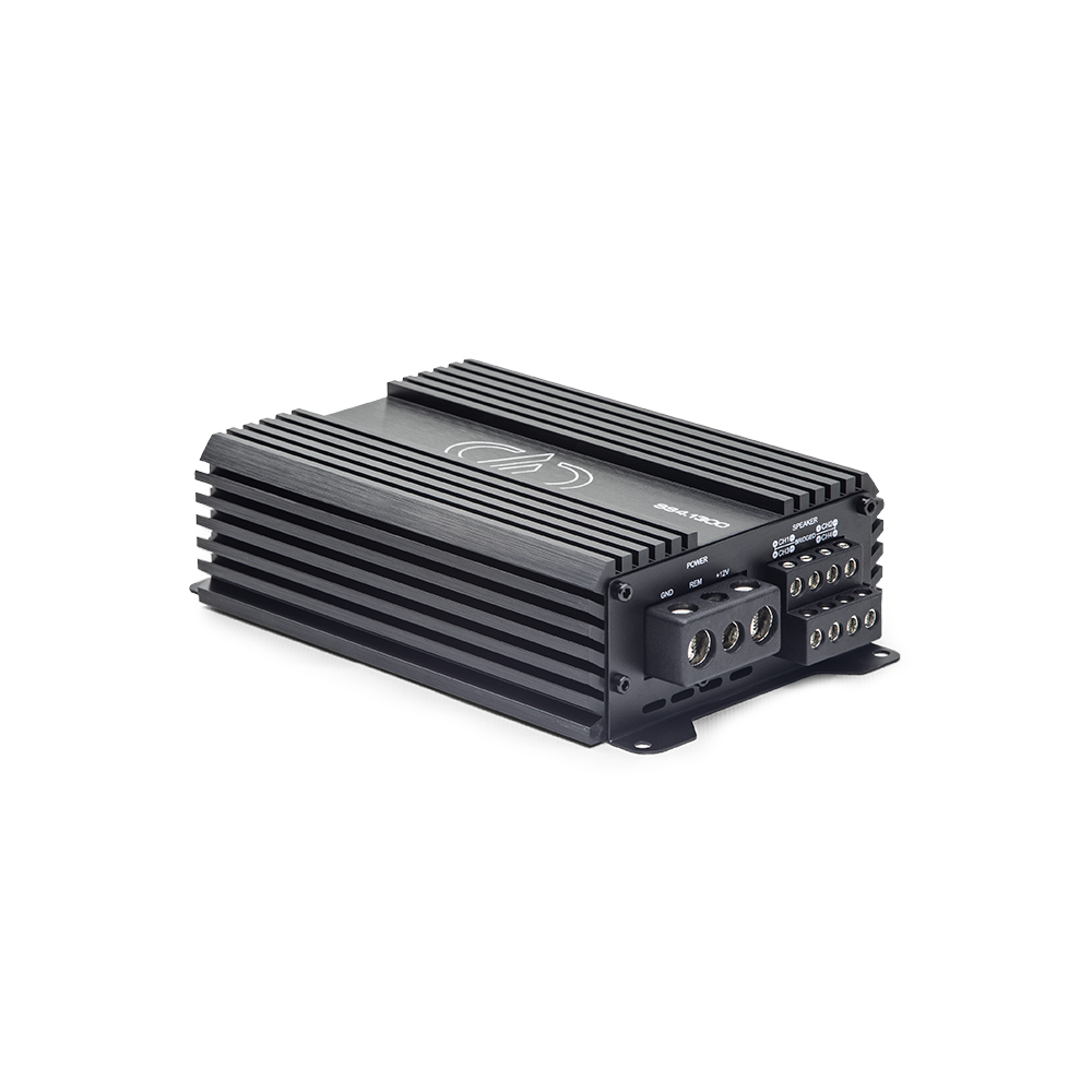 Photo of SS4.1300 shot at angle showing top plate, logo and model number with power and speaker connections on side