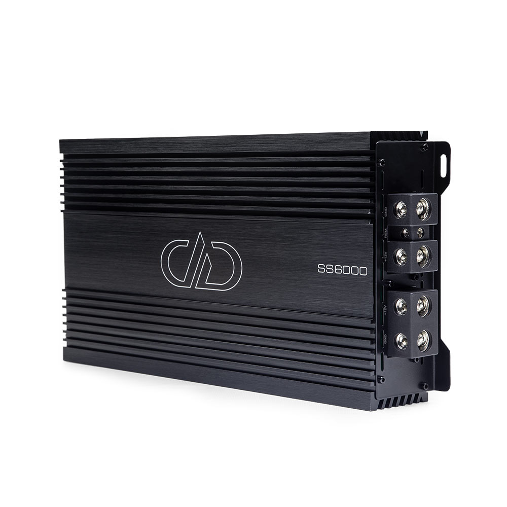 Photo of SS6000 on side showing full top plate with logo and model number, and part of end panel with power connection points