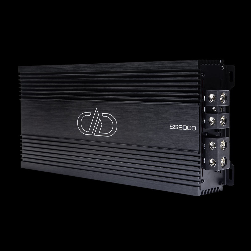 Photo of SS9000 on side showing full top plate with logo and model number, and part of end panel with power connection points