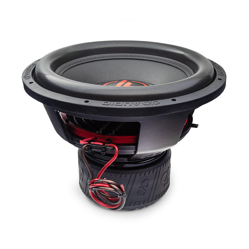 Photo of 715g top down angled forward to show surround, cone, dustcap backed by basket, leads, and motor in boot