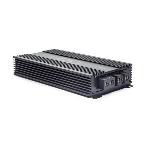 Photo of SS6000 laying flat with top plate facing up showing logo and model number, and part of end panel with power connection points