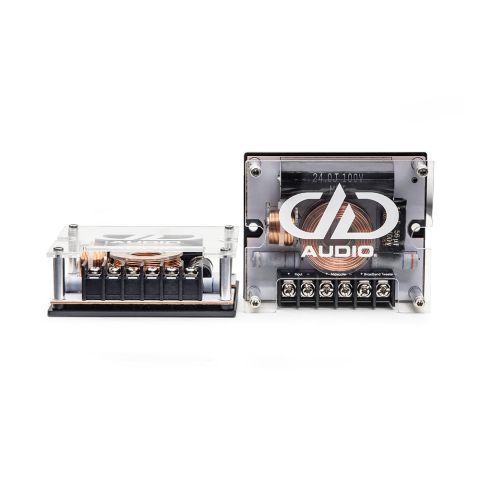 Photo of C Series 2 Way Crossovers, one facing front showing acrylic plate with DD logo above copper winding, and screw terminals, the other on side showing acrylic top and screw terminals