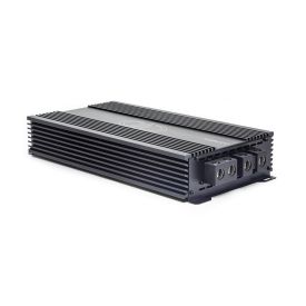 Photo of SS6000 laying flat with top plate facing up showing logo and model number, and part of end panel with power connection points