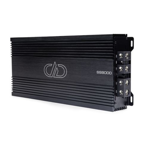 Photo of SS9000 on side showing full top plate with logo and model number, and part of end panel with power connection points