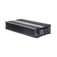 Photo of SS6000 laying flat with top plate facing up showing logo and model number, and part of end panel with power connection points